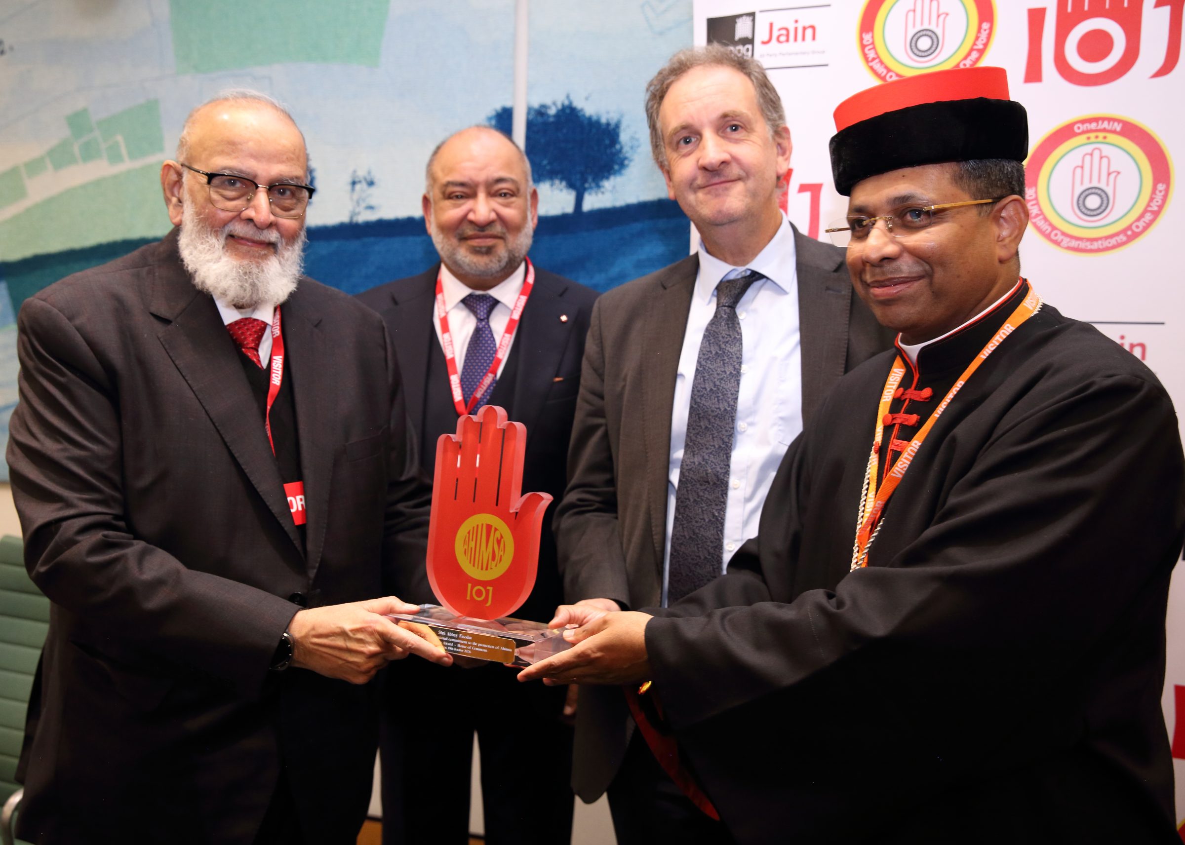 Dr Abhay N. Firodia receiving the IOJ Ahimsa Award at the House of Commons, London